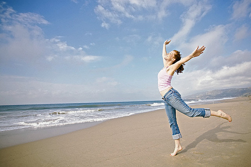 young-woman-beach-waves-dancing-joy-healthy-supple-flexible young-woman-beach-waves-dancing-joy-healthy-supple-flexible