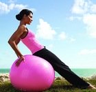 yoga-woman-reclines-on-large-exercise-ball